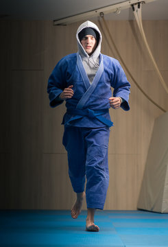 Sportsman warms up out before a sports training