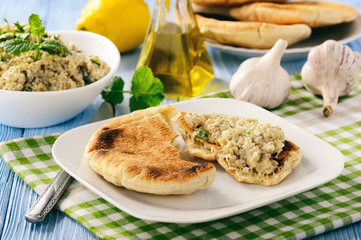 Traditional greek eggplant spread (dip) with pita bread.
