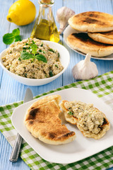 Traditional greek eggplant spread (dip) with pita bread.
