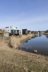 Fototapeta na wymiar new houses in homerus buurt in Almere Poort in the netherlands