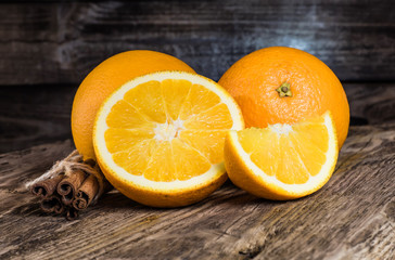 Fresh oranges on a wooden table