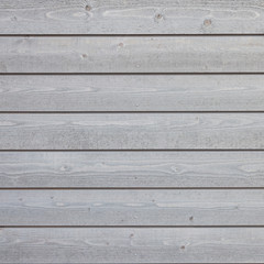 square part of horizontal planks with light grey paint