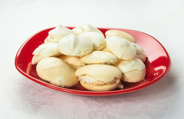 red plate with meringues