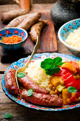 Couscous and Merguez Sausages.selective focus