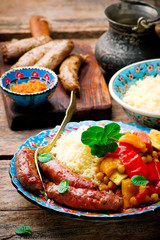 Couscous and Merguez Sausages.selective focus