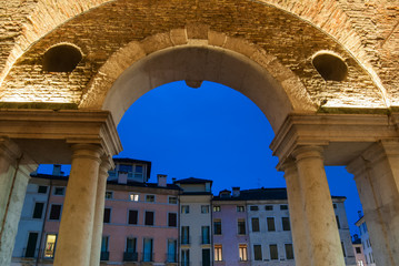 Night view of the colonnade of the Palladian Basilica, Vicenza, Italy