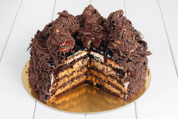 Chocolate cake on a white wooden table