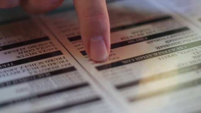 Choosing a dish from the menu in restaurant