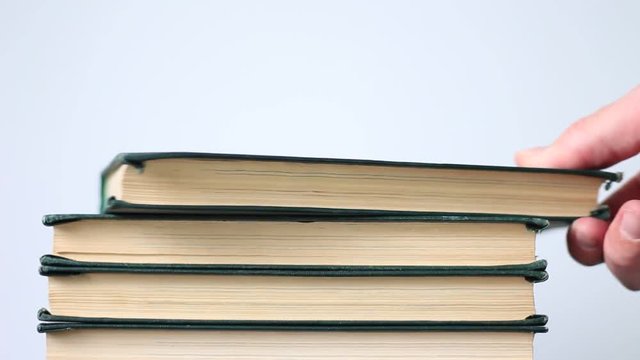 Taking books from a stack