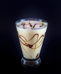 Caramel frappuccino on a black background