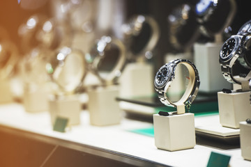 Men watches in a showcase of a luxury store in London.