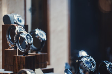 Men watches in a showcase of a luxury store in London.