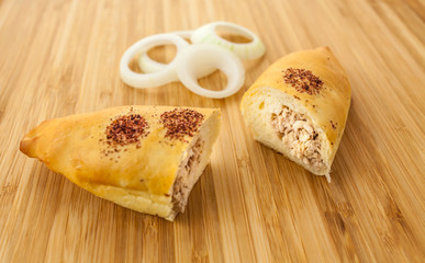 Puff pastry with tuna fish and onion