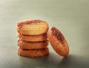 Cinnamon biscuits on a gray background