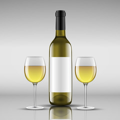 bottle of white wine with glass