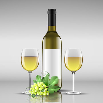 bottle of white wine with glass