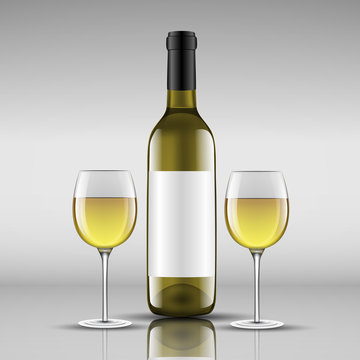 bottle of white wine with glass
