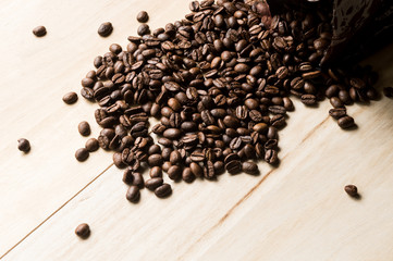  bag with coffee beans on a wooden background