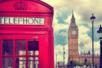 London - Big Ben tower and a red phone booth. Vintage film effect. Instagram filter
