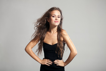 Beautiful young girl in a black dress
