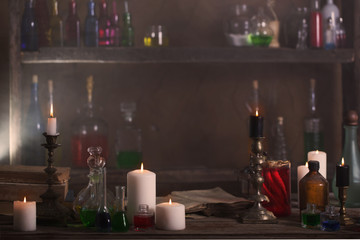 Magic potion, ancient books and candles