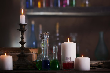 Magic potion, ancient books and candles