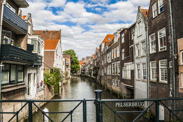 Holland. Pelserbrug in Dordrecht.  Ancient houses in Dordrecht on canals.  Oldest city in Netherlands. Houses on canals. 