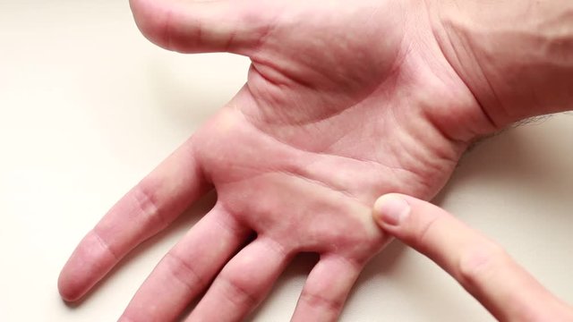 Finger pointing out hand's palmistry lines