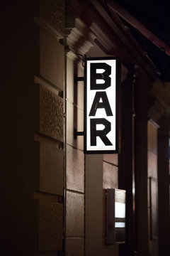 Bar vertical signage outside a building