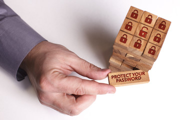 Business, Technology, Internet and network concept. Young businessman shows the word: Protect your password