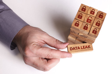 Business, Technology, Internet and network concept. Young businessman shows the word: Data leak