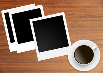 Obraz na płótnie Canvas Polaroid Film Vintage empty photo cards and cup of coffee on wood background