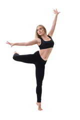 Fototapeta premium Pretty fitness trainer in black top studio shot