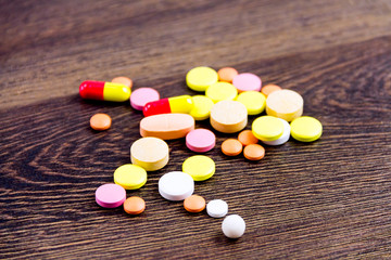 Medical treatment with the help of pills, capsules and tablets