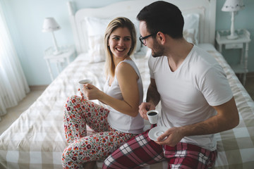 Fototapeta premium Cute couple in love drinking coffee