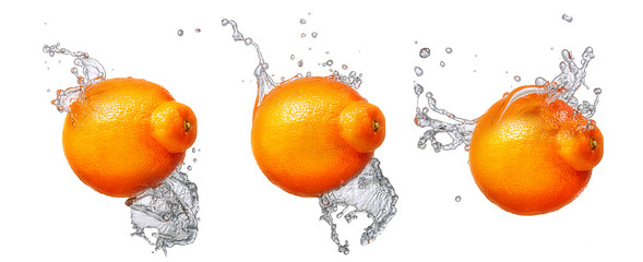 Fototapeta na wymiar Water splash and fruits isolated on white backgroud. Fresh mandarin