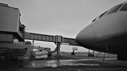 The element of the fuselage of the passenger commercial aircraft on the airfield