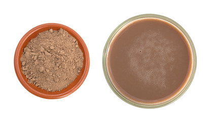 Glass of chocolate milk with cocoa in a bowl isolated on a white background.