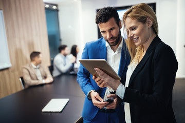 Business colleagues having meeting in conference room