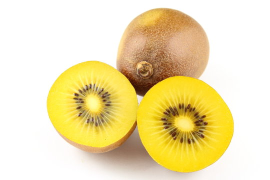 fresh yellow kiwi fruits isolated on a white background