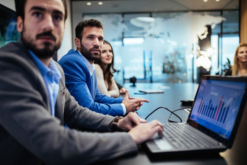 Business people brainstorming in office