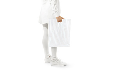 Blank white plastic bag mockup holding hand. Woman hold clear carrier sac mock up. Plain bagful...