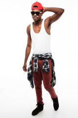 Handsome young african man wearing cap and sunglasses