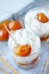 Oats layered with spicy apricot jam. Healthy food concept.