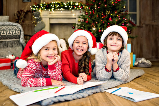 Happy kids drawing picture
