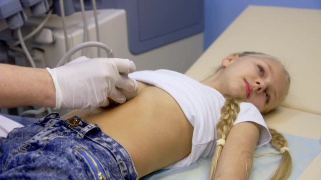 girl in the hospital doing ultrasound