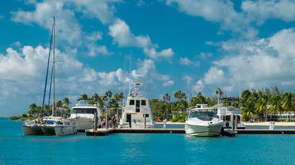 Fototapeta premium Kaibo marina and its boats on the Caribbean Sea, Grand Cayman, Cayman Islands