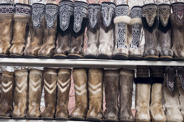 Nenets boots from deer fur are selling in the winter street