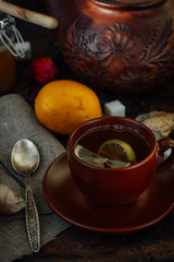 Nice and hot ginger tea with lime and lemon.