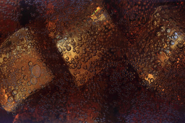 cola drink with ice cubes texture